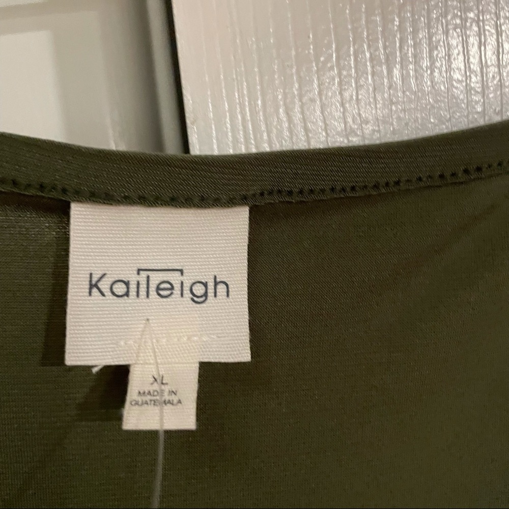 Super cute green jumpsuit NWOT. I lost weight abs this no longer fits.